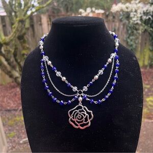Elegant Silver Rose Necklace with Blue Beads